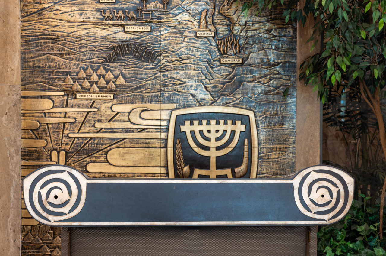 Lectern in front of the Land of Israel bas-relief